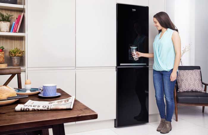 girl with hot water dispenser